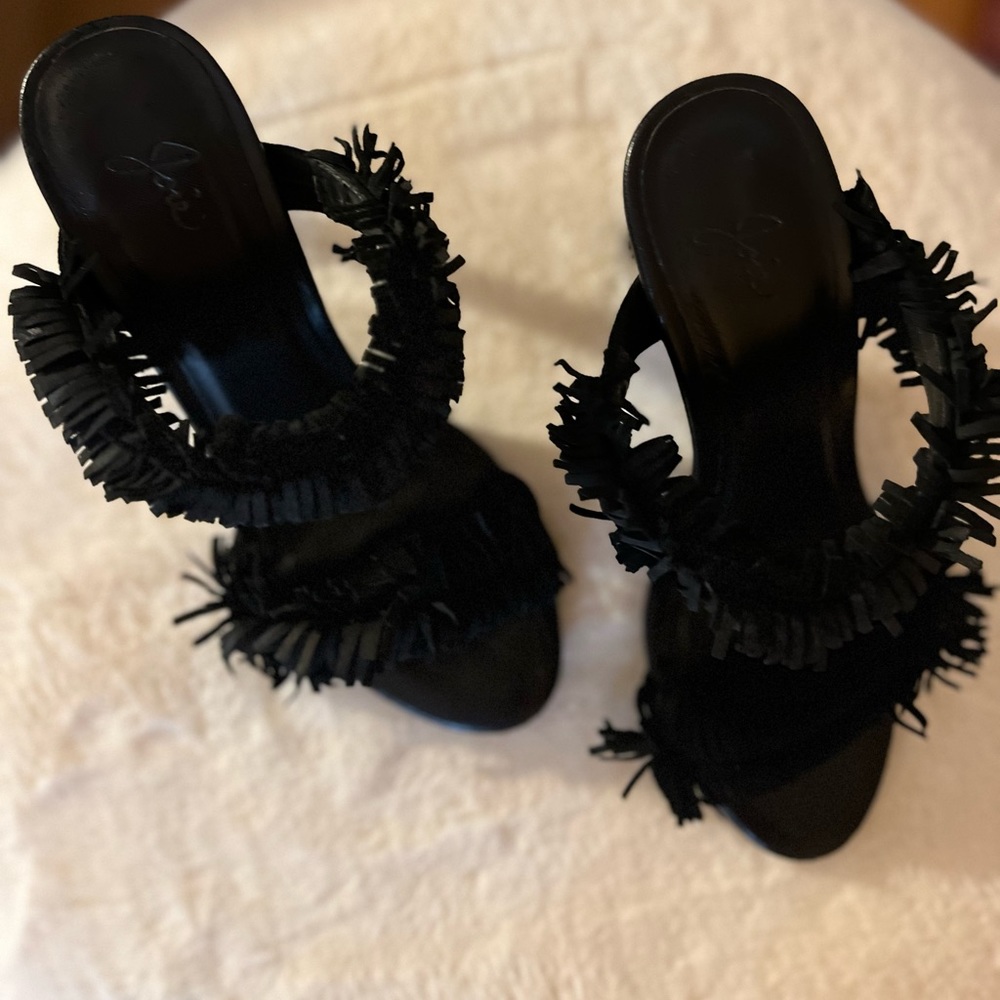 Joie black suede high heel sandals with fringes.